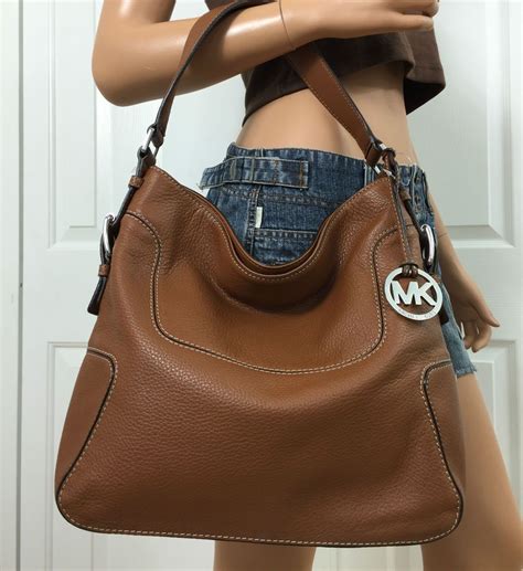 michael kors bags store locator|Michael Kors official website.